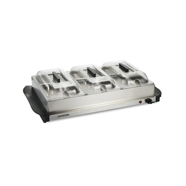 bufetera charola calentadora hamilton beach proctor silex mod 34300r servidor de bufet plateado, vista frontal 3/4 con tres bandejas transparentes con tapas, carcasa de acero inoxidable, perilla de control y luz indicadora en el costado; capacidad 3x2.4 L y cable de 118 cm. También suele usarse como bandeja calefactora portátil para eventos pequeños.