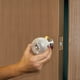 thumbnail image 3 of Fundas de seguridad para pomos de puerta a prueba de niños Dreambaby, paquete de 3, blancas, 3 of 6