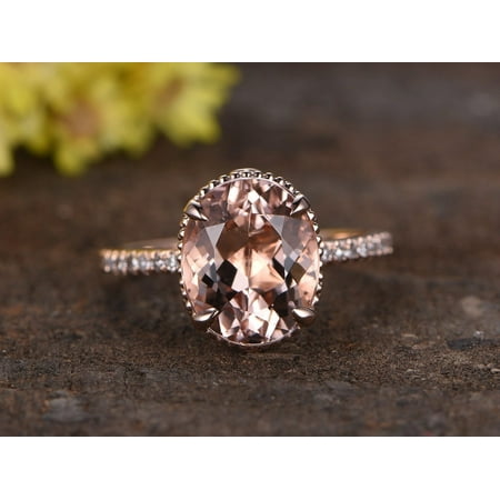 - Antique 1.50 Carat Oval Cut Morganite and Diamond Engagement Ring in Rose Gold