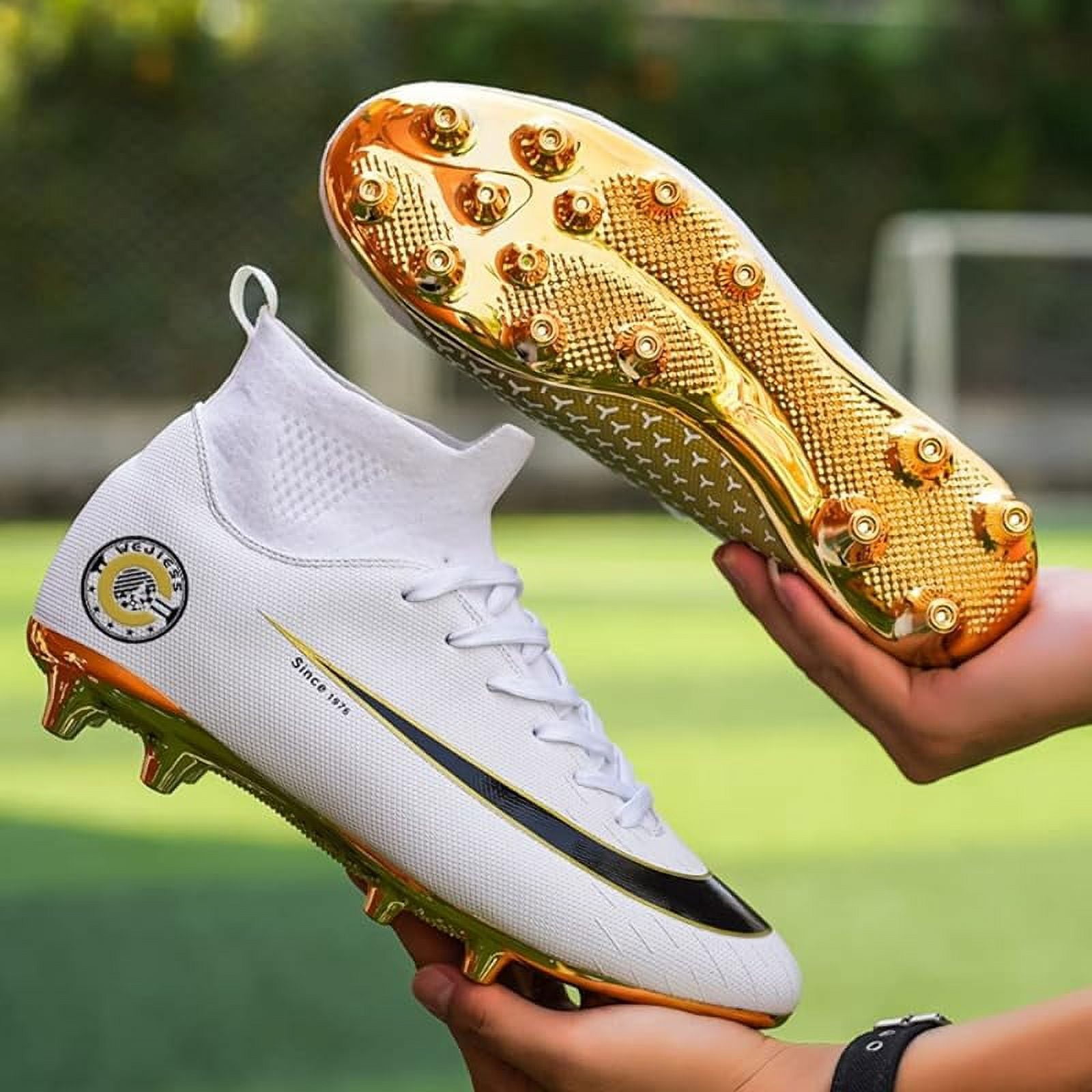 white and gold soccer boots