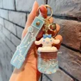 thumbnail image 1 of Sanrio Cartoon Anime Cinnamon Roll Melody HelloKitty Oil Quicksand Drift Bottle Mochila Llavero Niña Linda Muñeca Colgante Regalo, 1 of 3