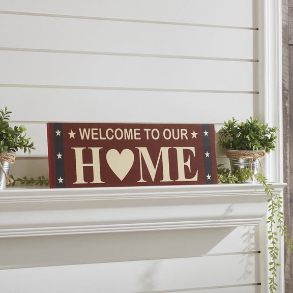 VHC Brands Patriotic Welcome To Our Home w/Stars On Blue Stripes MDF Wall Sign 6x18, Independence Day Decor, Decorative Sign, Rustic Farmhouse Fourth of July Decorations, Burgundy, Navy Blue, Creme