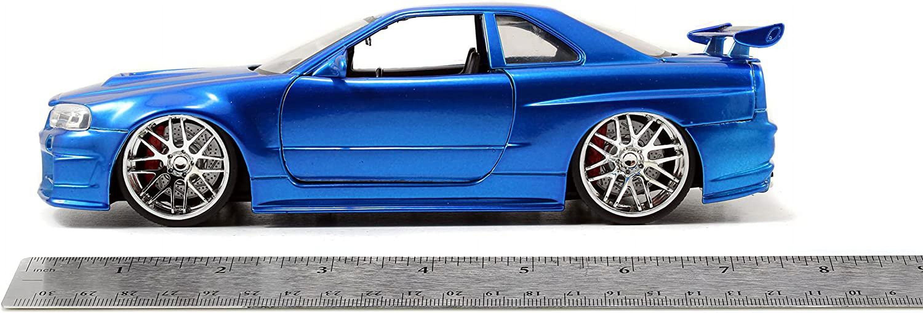  Jada Toys Fast & Furious Brian's 2002 Nissan Skyline R34  Die-cast Car, 1:24 Scale, Silver & Blue : Toys & Games