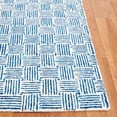 thumbnail image 3 of SAFAVIEH Micro-Loop Charlotte Solid Area Rug, Navy/Ivory, 5' x 8', 3 of 10