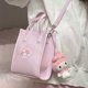 thumbnail image 2 of Bolso Sanrio de dibujos animados Cinnamoroll Kuromi Melody, bolso de mano para mujer, bolso de mano de gran capacidad, bolso de mensajero Melody Y2k, lindo bolso de hombro, 2 of 5