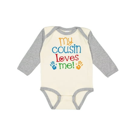 

Inktastic My Cousin Loves Me Boys or Girls Long Sleeve Baby Bodysuit