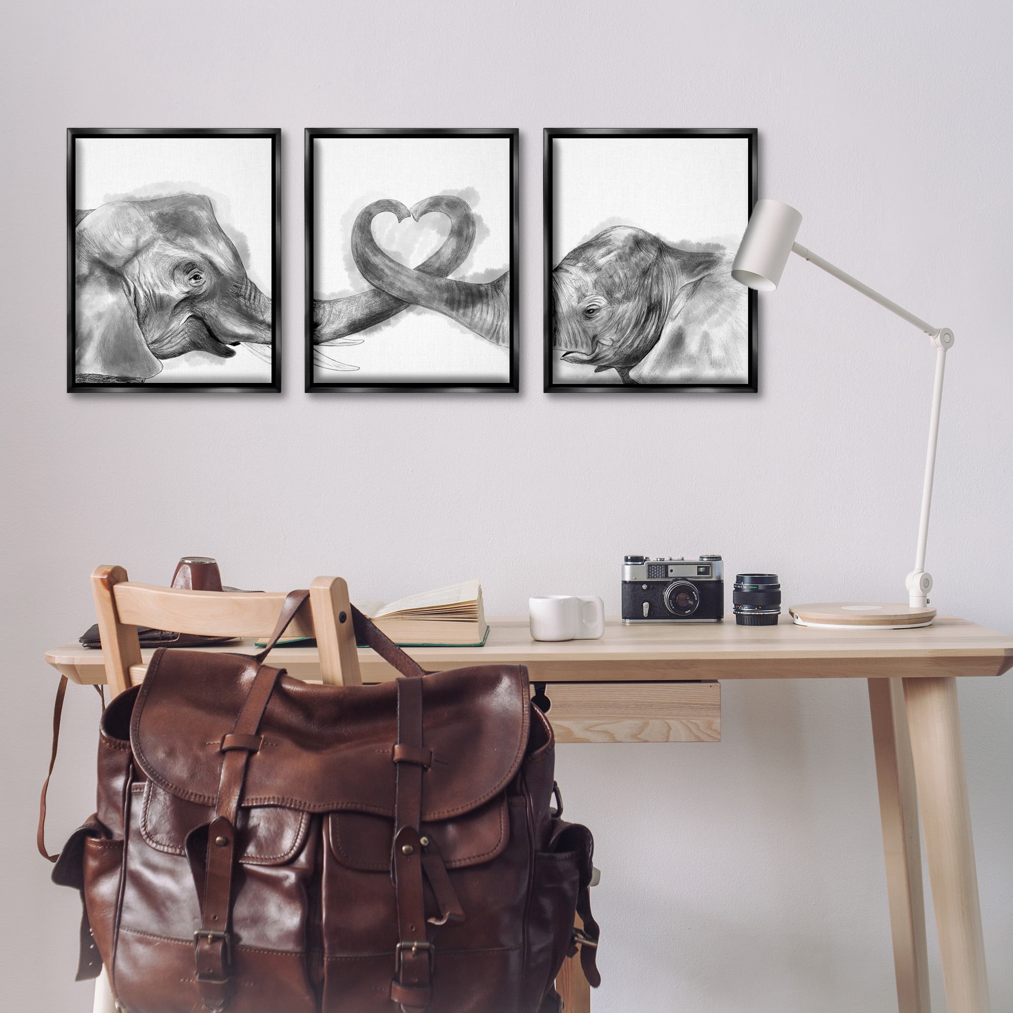 Stupell Industries Elephant Trunk Heart Shape Animals & Insects Painting Black Floater Framed Canvas Art Print Wall Art, 17 x 21, Set of 3