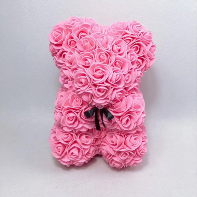Oso rosa le da a su novia un regalo de flores simuladas de espuma de PE, muñeco de oso abrazable