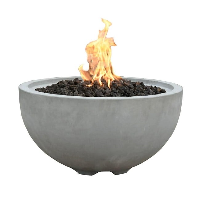 Modeno Nantucket concrete fire bowl filled with lava rocks and lit liquid propane flame.