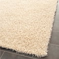 thumbnail image 3 of SAFAVIEH Clyde Solid Plush Polyester Shag Area Rug, Cream, 2'6" x 4', 3 of 6