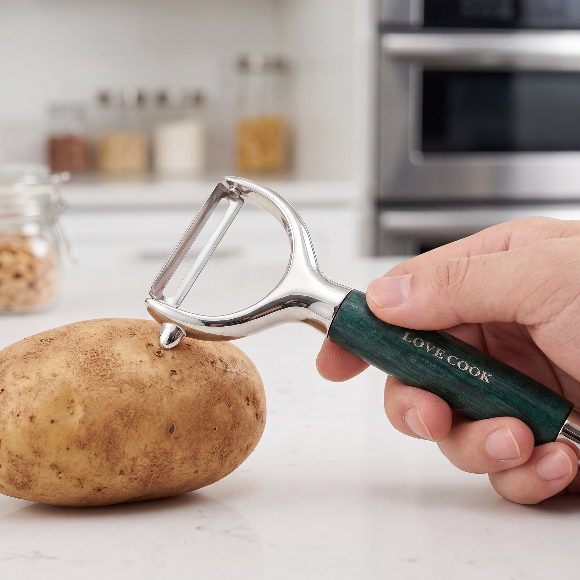 Unique Bargains Stainless Steel Ergonomic Peeler with Hang Handle Gold-2 6.6" x 2.8"