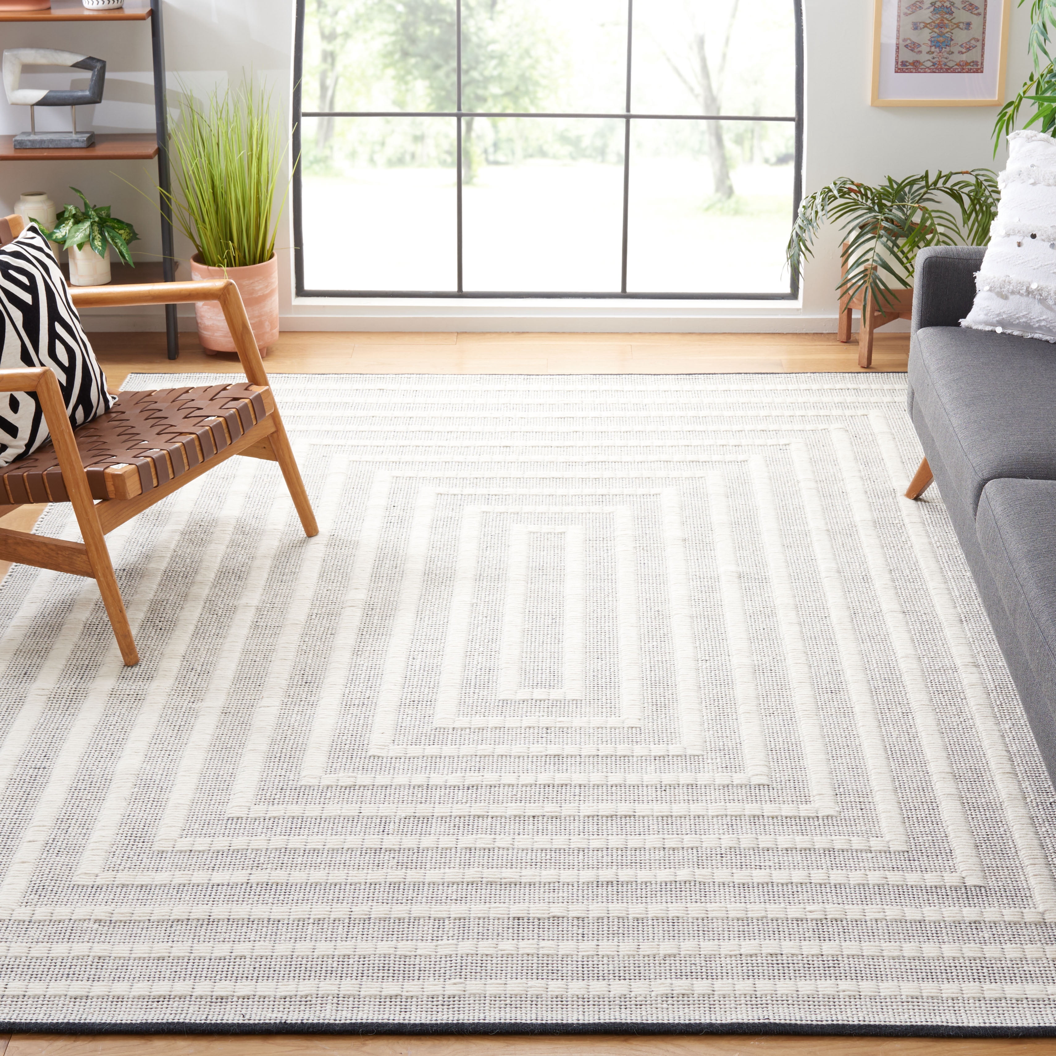 SAFAVIEH Natura Allen Bordered Area Rug, Black/Ivory, 8' x 10'