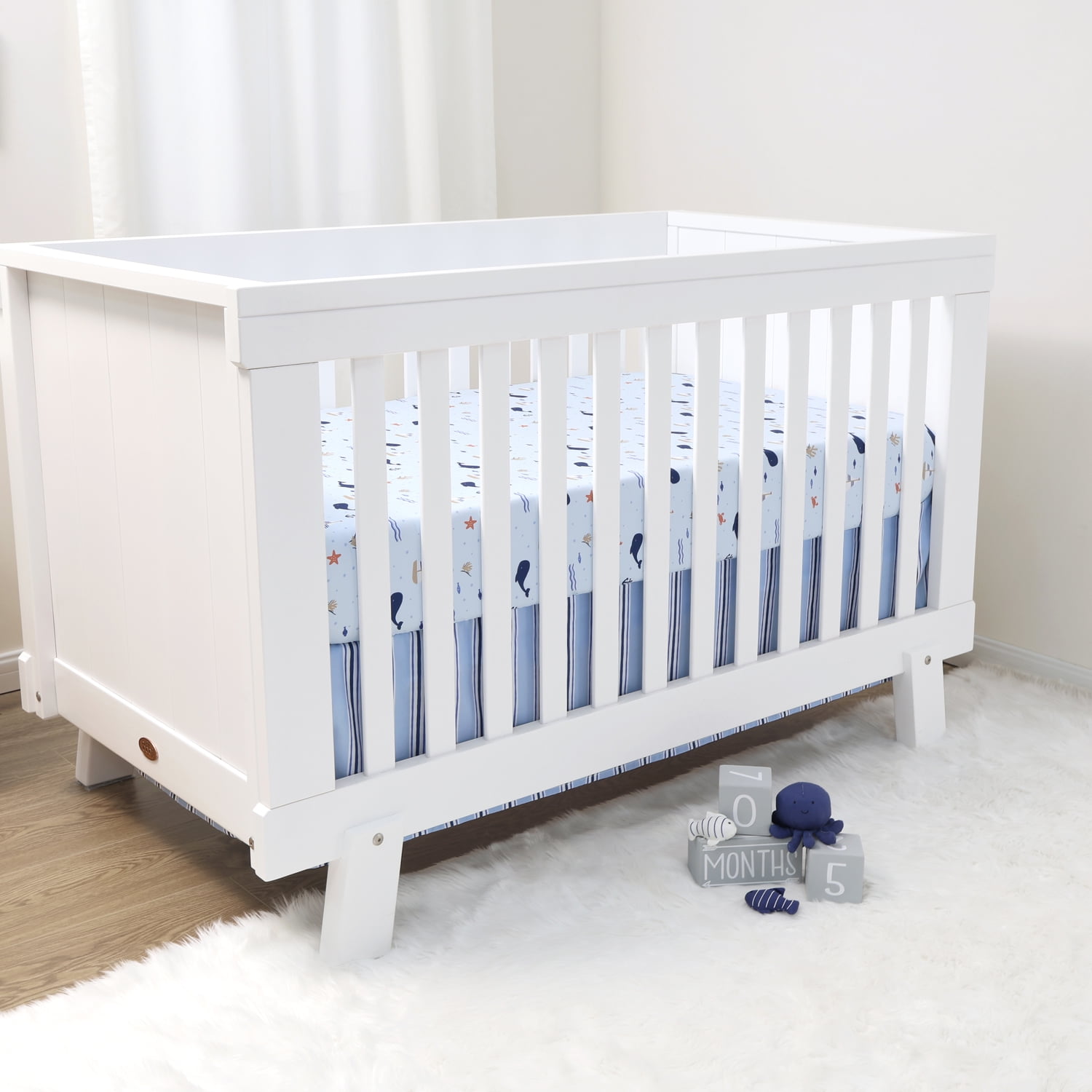 The Peanutshell Nautical Patch 3-Piece Baby Crib Bedding Set with Quilt Blanket, Crib Sheet, and Skirt