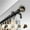 Black, variant on Central Design 100-49-482 1 in. Dia. Amber Curtain Rod, Black - 48-84 in.