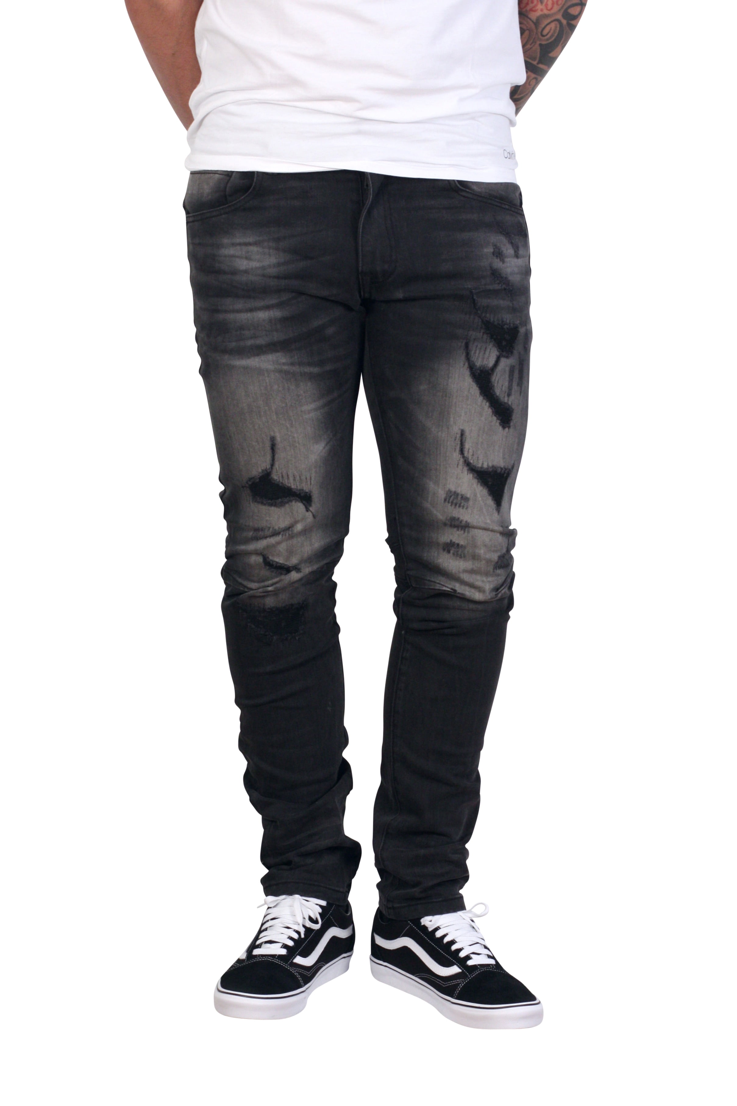 black jeans with lots of rips