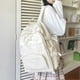 thumbnail image 3 of Mochila de color liso para estudiantes, ligera y portátil, ideal como regalo para niños y niñas, color blanco., 3 of 5