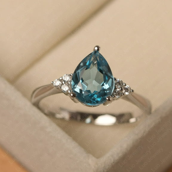 Swiss blue topaz engagement ring, November birthstone, solid sterling silver, tear drop shaped, funny gifts for women