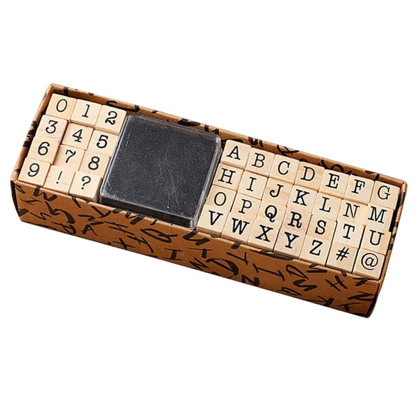 40 letras del alfabeto con sellos de goma de madera, números y símbolos. máquina de escribir