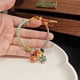 thumbnail image 1 of Siete manos sabias cuerda siete colores pluma en tierra buena suerte ganar preparación DIY cuerda roja hombres y mujeres examen de ingreso a la escuela secundaria pequeño regalo, 1 of 5