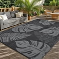 thumbnail image 1 of Garvee Tapis d'Extérieur 9 Pieds X 18 Pieds Imperméable en Paille Plastique, Tapis Tissé Moderne à Feuilles Tropicales Résistant aux UV, Tapis Réversible pour Patio, VR, Terrasse, Plage, Véranda, Noir Gris, 1 of 5
