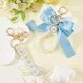 thumbnail image 4 of Bowknot Pearl Keychain Blue Women with Wristlet Bracelet Lobster Clasp Cute Bag Charm Keyring Stainless Steel Hoop for Purse Bag Car Handbags Tote Bag Backpack Pendant Accessories Blue, 4 of 6