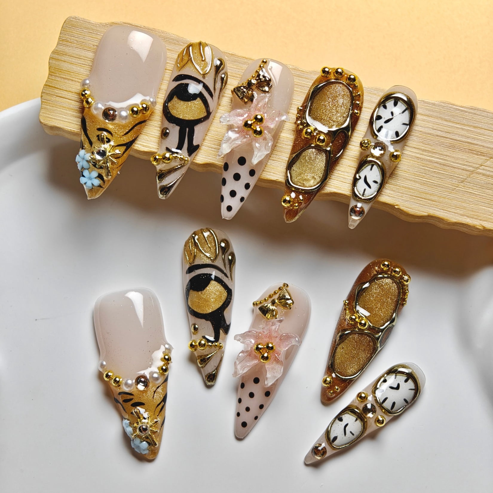 Handmade Press-on Nails with Gold Accents and 3D Artistic Design