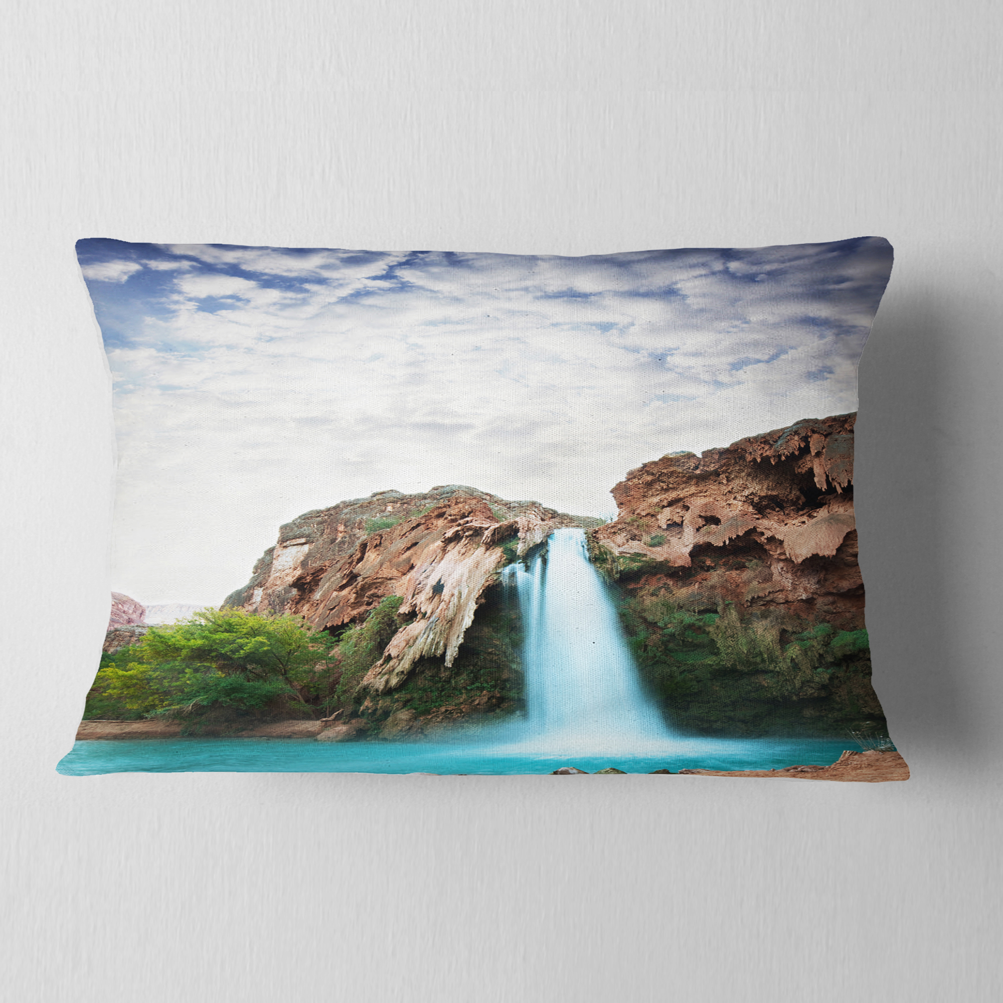 Designart Amazing Waterfall under Cloudy Sky - Landscape Printed Throw Pillow - 12x20
