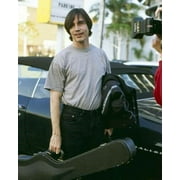 Jackson Browne 8x10 inch press photo carries his guitar at event 8x10 photo