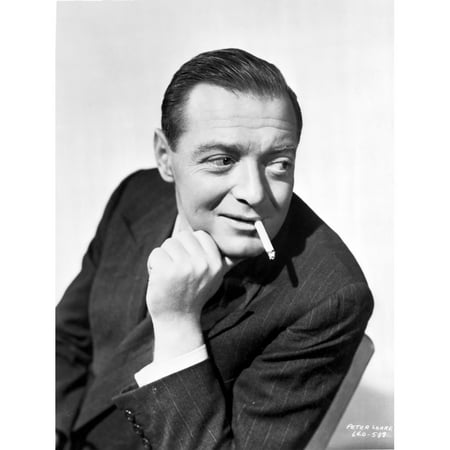Peter Lorre in Posed while Smoking Cigarette wearing Tuxedo Black and White Portrait Photo Print - Item # VARCEL692381