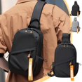 thumbnail image 1 of Bolsa pectoral impermeable multifuncional negra para hombre, mochila bandolera de gran capacidad de 31×18×9 cm con correa ajustable, puerto para auriculares y múltiples bolsillos para viajes, 1 of 5