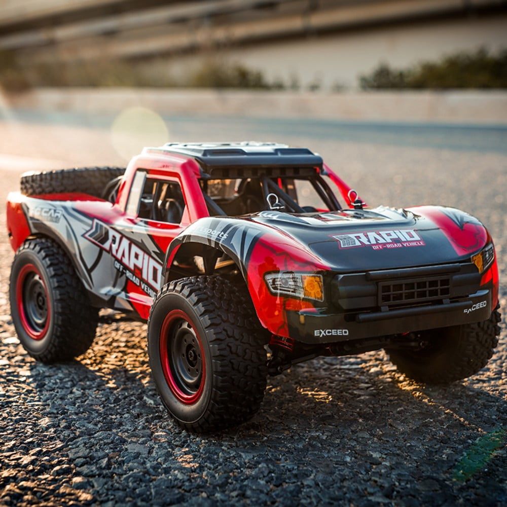 Q130A 1/16 Full Scale 4WD High Speed Car RC Monster All Terrain Off Road Vehicle RC Racing Car Carbon Brush Strong Magnet for Adults and Kids, Red