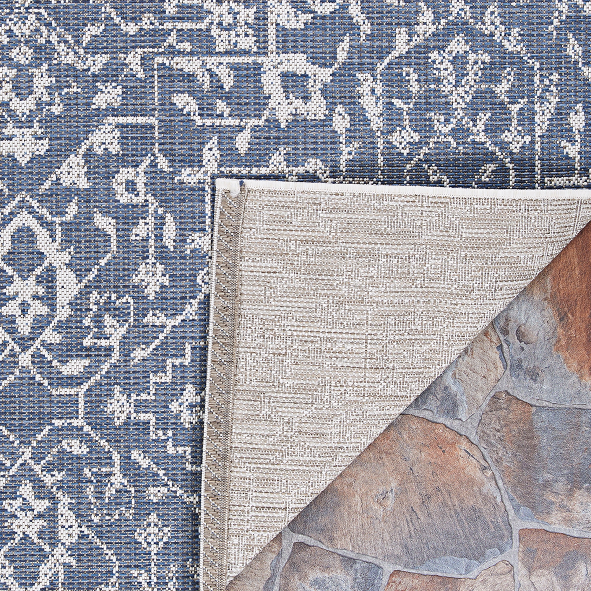 Couristan 5.5' x 9' Ocean Blue and Ivory Outdoor Floral Rectangular Area Throw Rug
