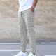 thumbnail image 1 of Pantalones largos para hombre, estilo casual, deportivo, a cuadros, con cintura elástica y bolsillos., 1 of 3