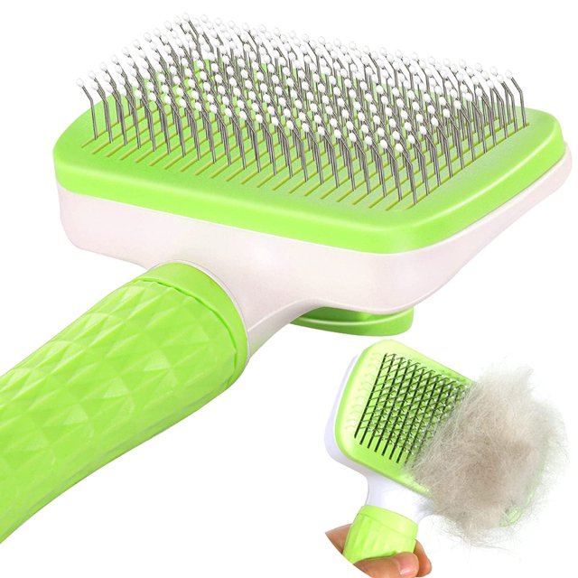 El cepillo para mascotas, que se limpia solo con un simple toque, es una herramienta eficaz para el aseo de las mascotas y para eliminar el pelo suelto. (Mediano)