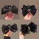 thumbnail image 3 of Elegante horquilla de alta gama con forma de tiburón y pinza para el pelo de plumas negras grandes para mujer, 3 of 6
