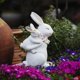 thumbnail image 1 of Escultura de Pascua de resina CUTICAT estatua de conejito, 1 of 5