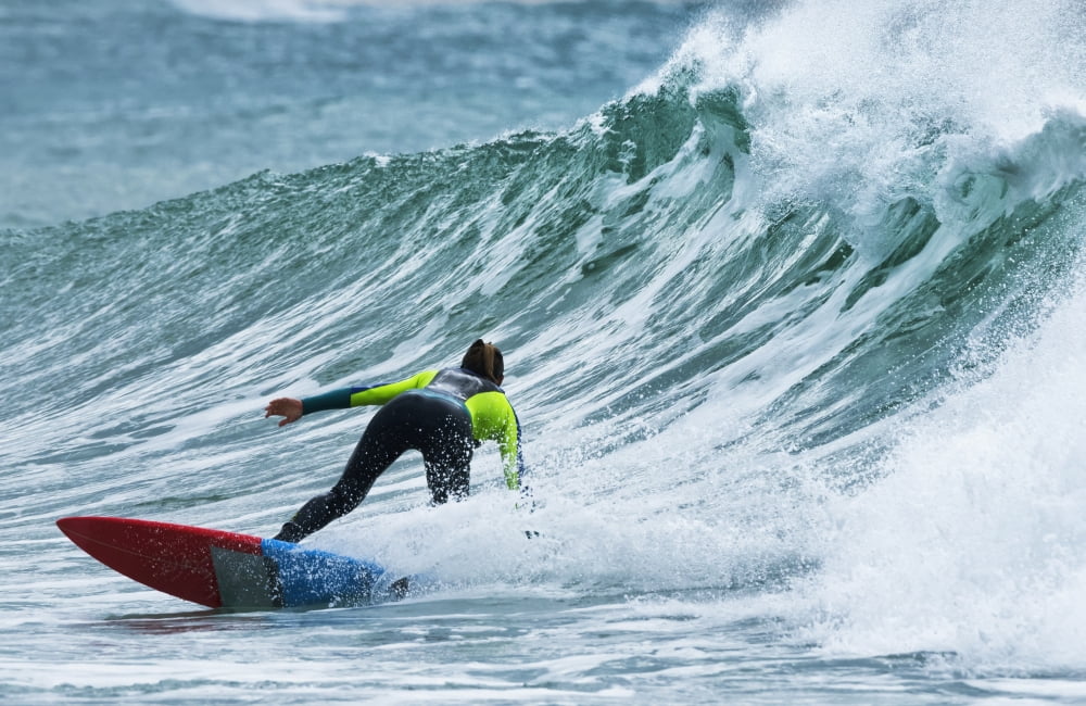 Surfer Catching A W