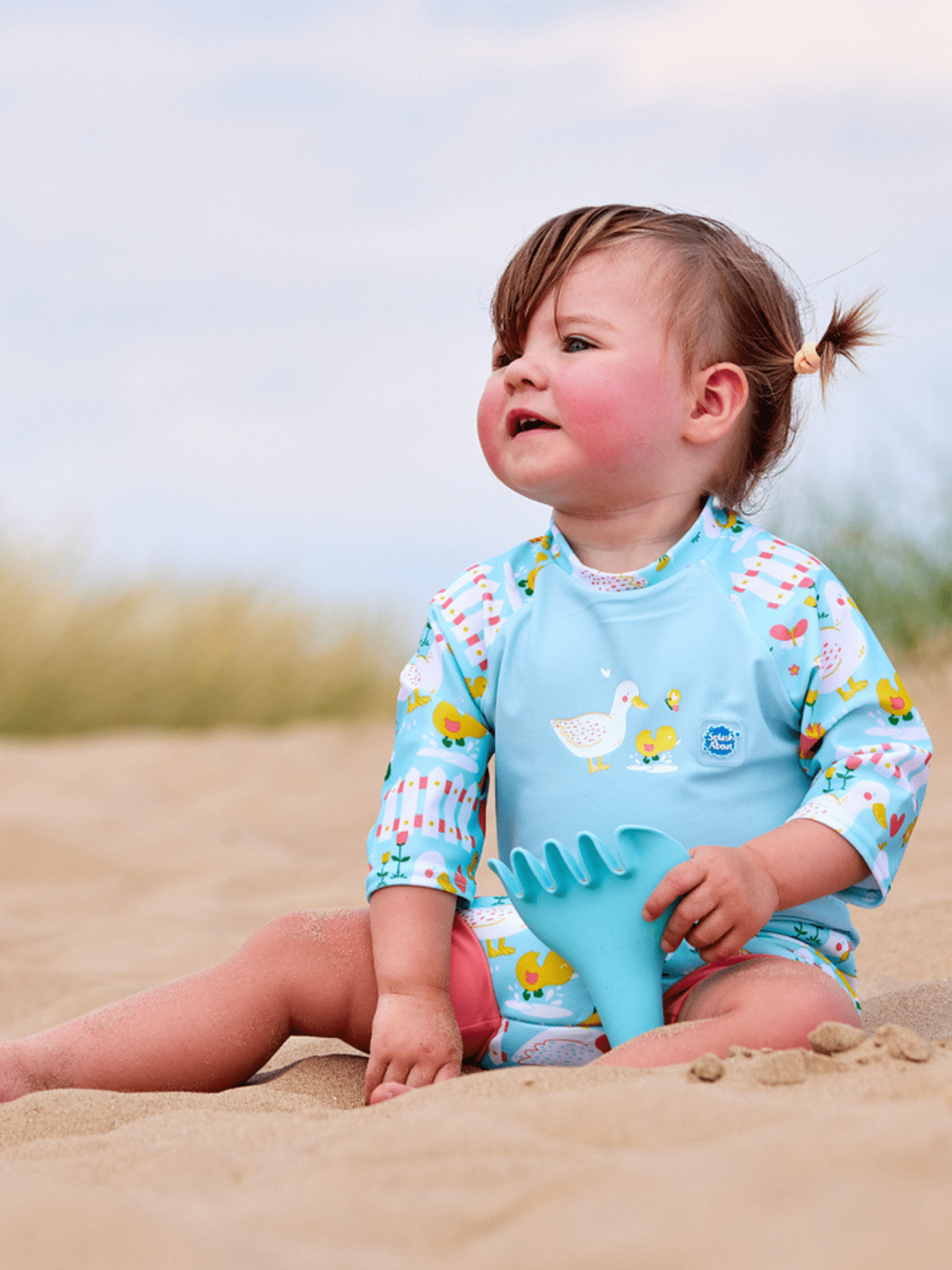 Splash About Baby Girl's Happy Nappy Sunsuit, One-Piece Swimsuit with Swim Diaper - Little Ducks, 12-24 Months