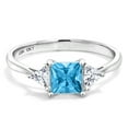 thumbnail image 2 of Gem Stone King 10K White Gold Swiss Blue Topaz and White Moissanite 3 Stone Engagement Ring for Women (1.12 Cttw, November Birthstone, Princess 5MM, Trillion 3.5MM, Size 9.5), 2 of 5