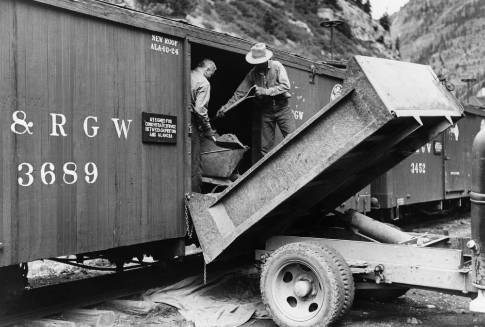 Freight Car, 1940. /Nworkers Loading Gold Ore Concentrate Into A Freight Car Of A Narrow Gauge