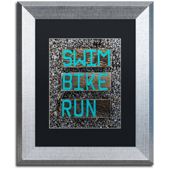 Trademark Fine Art 'The Triathlete' Canvas Art by Nicole Dietz, Black Matte, Silver Frame