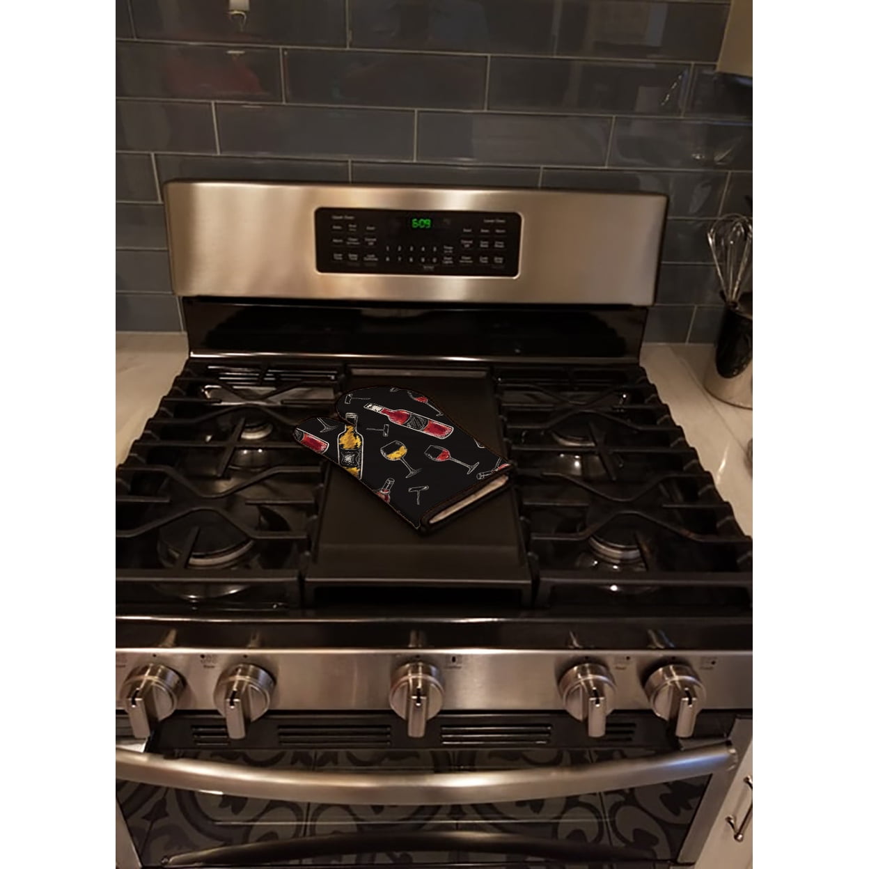 Red and White Wine on Black Oven Mitt