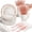 175PCS White and Rose Gold, variant on 175-piece party set, serving 25 guests, includes disposable party decorations, plastic forks, knives, spoons, gold polka dot paper plates, napkins, and paper cups.