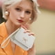 thumbnail image 5 of Monedero/tarjetero mini de piel suave con estampado de lichi y lazo para mujer – Cartera con cremallera para dinero en efectivo, tarjetas e identificación, bolso de mano compacto para uso diario., 5 of 6