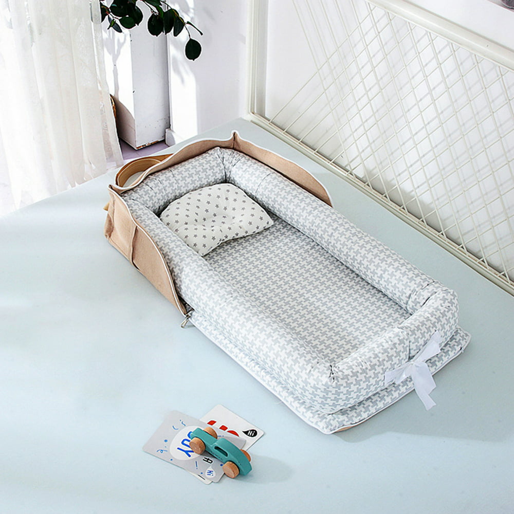 lightweight travel cot with bassinet