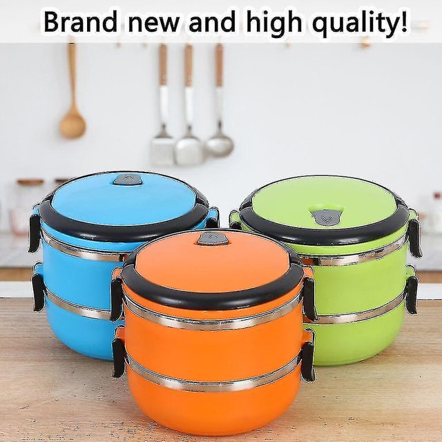 frasco de comida caliente, fiambrera de acero inoxidable termo aislado al vacío Trave portátil azul de doble capa — vista frontal centrada de tres fiambreras apilables con cierre de pestañas. Silueta cilíndrica de dos niveles con anillos de acero inoxidable y tapas a presión; fondo de cocina minimalista. Ideal como lonchera portátil para oficina o escuela.