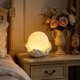 thumbnail image 1 of Lámpara de noche LED portátil para dormitorio: lámpara de mesilla LED suave para crear un ambiente hogareño, luz decorativa en forma de luna para estante o escritorio de la sala de estar., 1 of 6