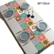 thumbnail image 2 of Se producen flores de colores vivos bordadas con un mantel ovalado de color blanco cremoso., 2 of 5