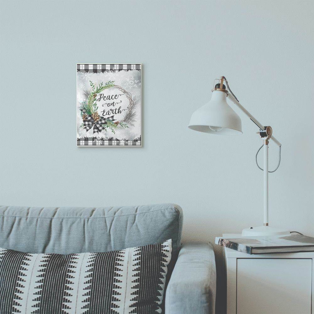 Stupell Industries Peace On Earth Wreath Plaid Holiday Christmas Word Design Wood Wall Art By Artist ND Art
