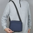 thumbnail image 4 of Blue Nylon Sling Bag, Lightweight And Water-Resistant, Practical Storage For Essentials, Ideal For Outdoor Activities, 4 of 6